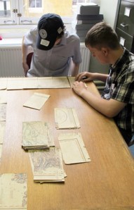 Matthew and Alex were quick to catch on to the best technique for sorting a map- do the outside pieces first, just like a puzzle!
