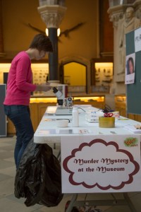 Sally Le Page sets up the forensic science experiments on the Murder Mystery at the Museum stall